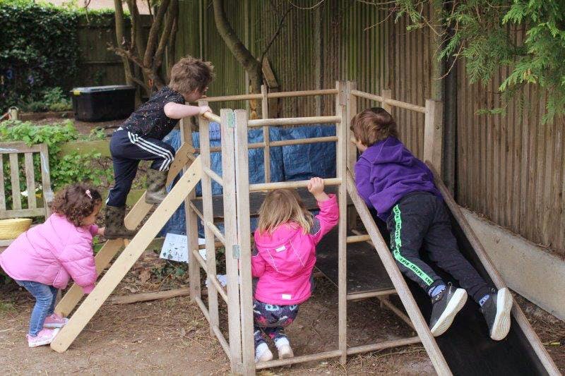 Children playing on a climbing frame