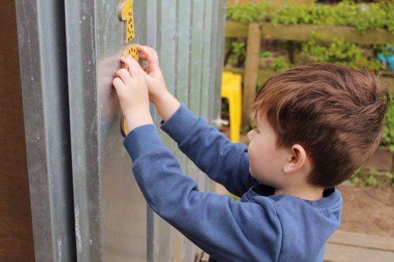 child using magnets